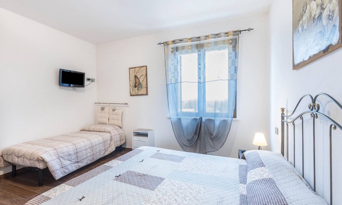 Villafranca di Verona Apartamento | Apartamento vacacional "La Siesta" con jardín compartido, balcón y Wi-Fi