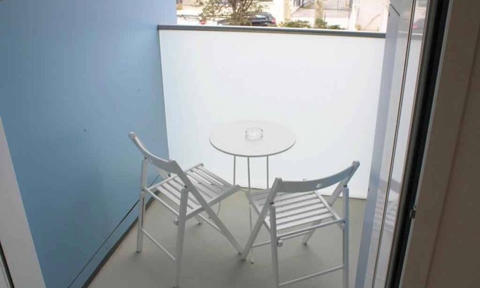 Lignano Sabbiadoro Apartamento | Apartamento vacacional con aire acondicionado y balcón en Lignano