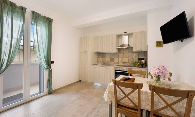Andora Apartamento | Apartamento vacacional "Antichi Ricordi - La Stalla" con terraza, piscina compartida y Wi-Fi