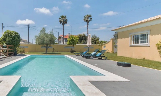 Ponte de Vagos Casa | Casa de vacaciones 'Amarela' con piscina compartida, Wi-Fi y aire acondicionado