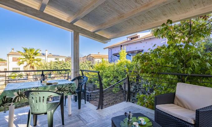 Bari Sardo Casa | Casa de vacaciones Appartamento LaTorre con balcón, terraza y jardín compartido