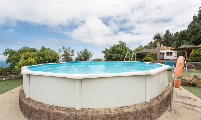 Buen Paso Casa | Casa de vacaciones "Candelaria" con vistas a la montaña y al mar, piscina, terraza y Wi-Fi