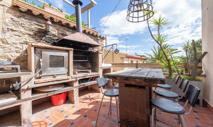 Almoster Casa | Casa de vacaciones 'Casa Rústica Cal Mian' con vistas a la montaña, Wi-Fi y aire acondicionado