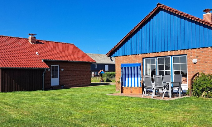 Pellworm Casa | Casa de vacaciones 'Ferienhaus Wellengang' con jardín compartido y Wi-Fi