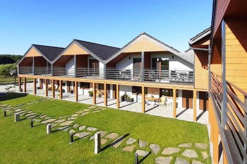 Mielno Casa | Holiday Home in Mielno near Beach & Lake
