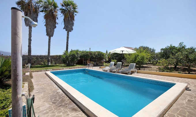Guimar Apartamento | Casa de vacaciones "Las Tres Palmeras" con vistas a la montaña, piscina compartida y Wi-Fi