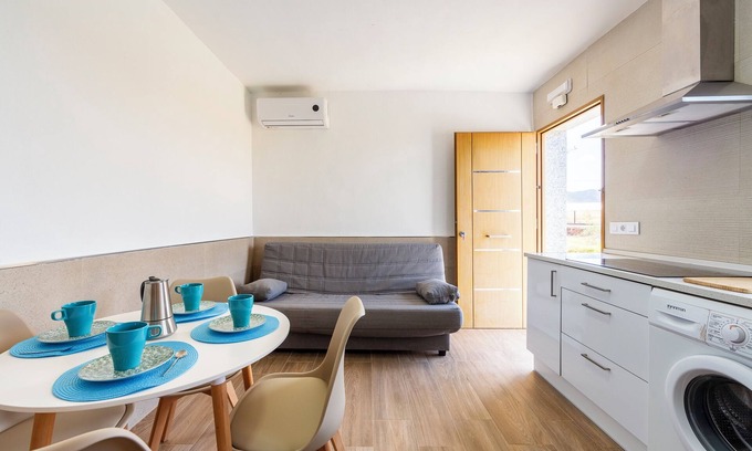 Pujaire Casa | Casa de vacaciones 'Nido' con terraza privada y aire acondicionado