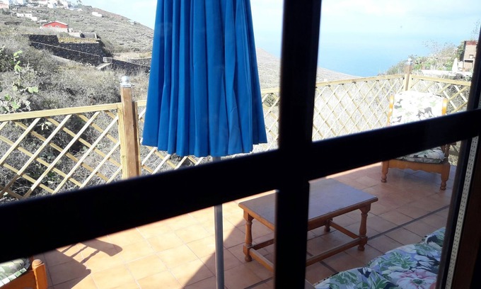 Mocanal Casa | Casa de vacaciones 'Sunset Hollidays Home' con jardín privado, balcón y Wi-Fi