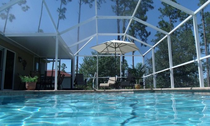 Joel Villa | Villa con piscina climatizada con energía solar en Lehigh Acres, cerca de Fort Myers