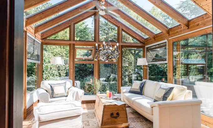 Langballigholz Otro | Casa de vacaciones con vistas al mar y sauna, chimenea y jardín de invierno ubicada directamente en el bosque