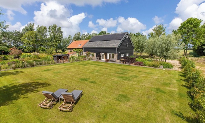 Grijpskerke Chalet De Esquí | Holidayhome - Pioniersweg 3 | Grijpskerke 'De kleine Pionier'