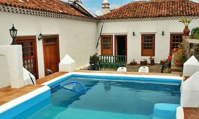 Valle de Guerra Casa | Homerez - Bonita casa a 12 km de la playa para 4 pers. con piscina compartida