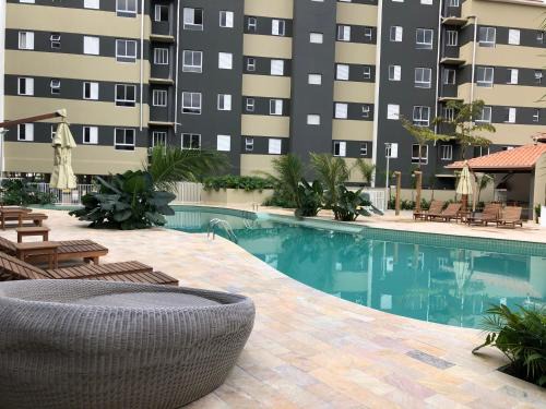 Estufa II Apartamento | Home Resort Palmeiras II - proximo Praia Grande