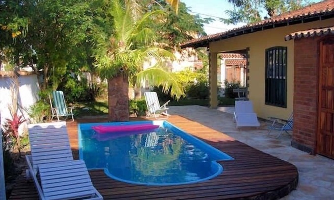 Palmeiras Casa | Casa de vacaciones en Cabo Frio, RJ - 1 suite + 3 habitaciones C / piscina C / aire acondicionado.