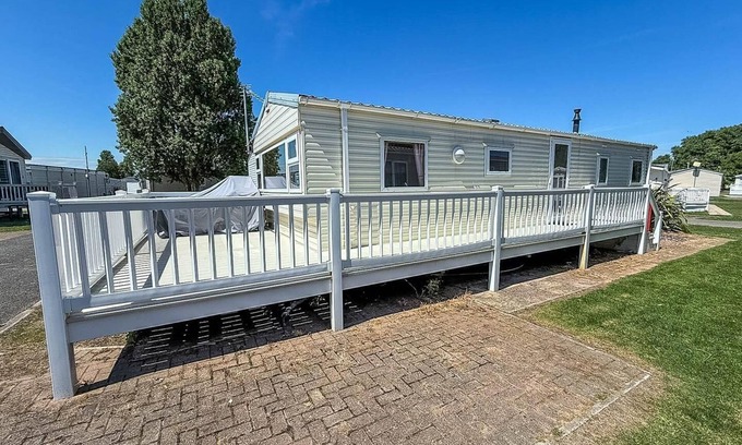 Walton on the Naze Casa | Homely 8 berth caravan with decking to relax on at Naze Marine, ref 17009WC