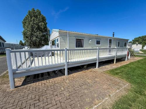 Walton on the Naze Otro | Homely 8 Berth Caravan With Decking To Relax On At Naze Marine, Ref 17009Wc