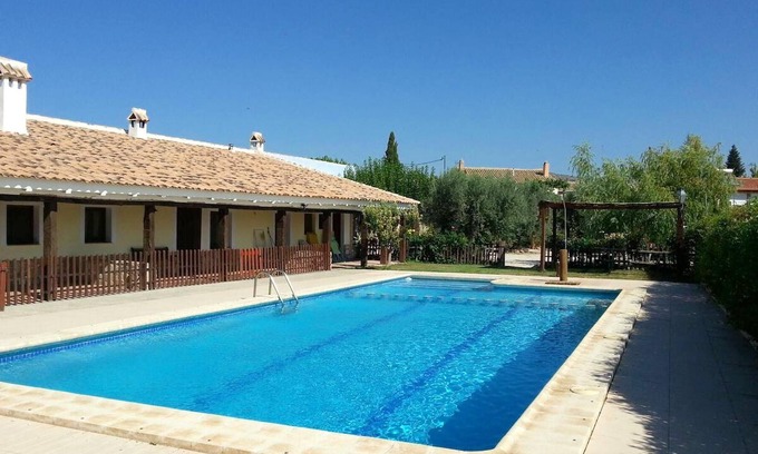 Caravaca de la Cruz Apartamento | Homerez - Apartamento para 4 pers. con piscina compartida, jacuzzi y terraza