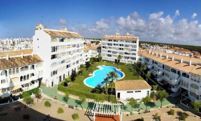 El Portil Apartamento | Homerez - Apto. El Portil, piscina.