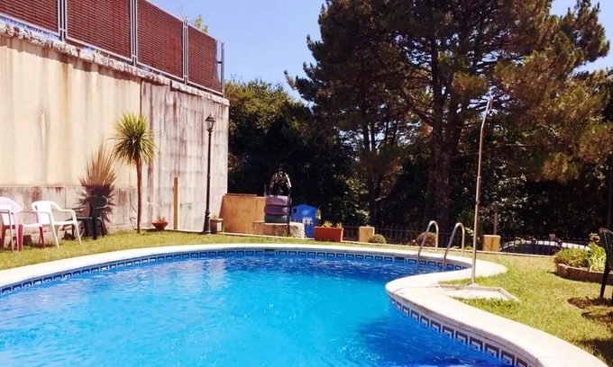 Poio Chalet De Esquí | Homerez - Big chalet 3 km away from the beach for 12 ppl. with swimming-pool