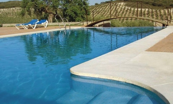 Estepa Casa | Homerez - Casa encantadora en Estepa con piscina compartida