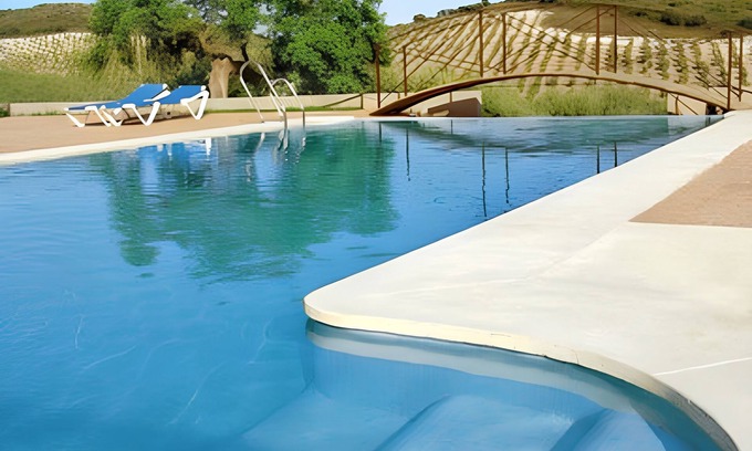 Estepa Casa | Homerez - Casa cómoda en Estepa con piscina compartida