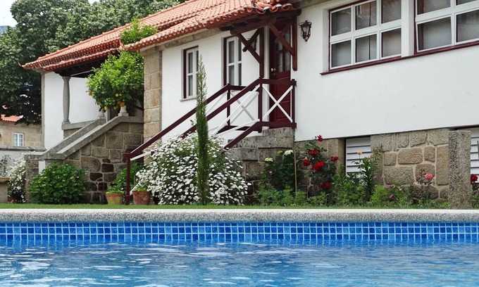 Fatauncos Casa | Homerez - House for 8 ppl. with shared pool, garden and terrace at Vouzela