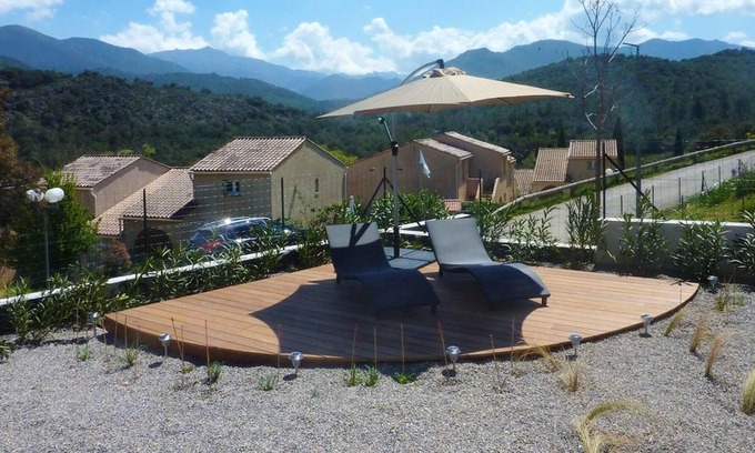 Ponte-Leccia Apartamento | Homerez - Apartamento para 6 pers. con jardín y terraza en Morosaglia