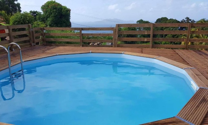 Trois-Rivieres Casa | Homerez - Nice house for 5 ppl. with shared pool and sea view at Trois-Rivières