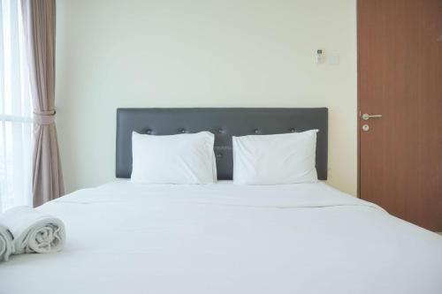 Kayu Putih Apartamento | Homey and Comfortable 2BR Tifolia Apartment By Travelio