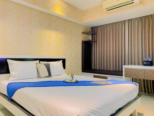 Cawang Apartamento | Homey and Comfy Studio H Residence Apartment By Travelio