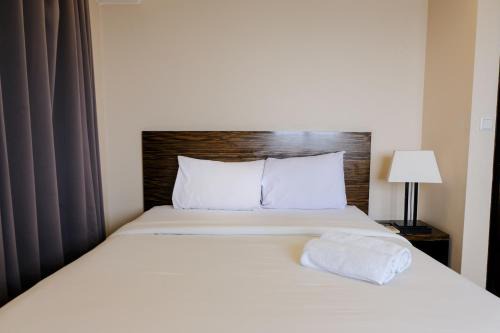 Braga Apartamento | Homey and Spacious 3BR Apartment at Braga City Walk By Travelio