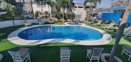 Playas Hotel | Hosteria Palmetto