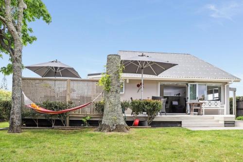 Pauanui Casa | Hosts on the Coast Sun Soaked Family Fun