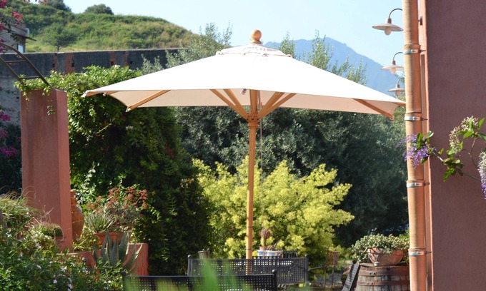 Rodi Milici Otro | House between citrus