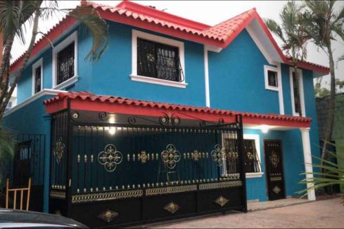 Ensanche Isabelita Casa | House-Blue-Mary