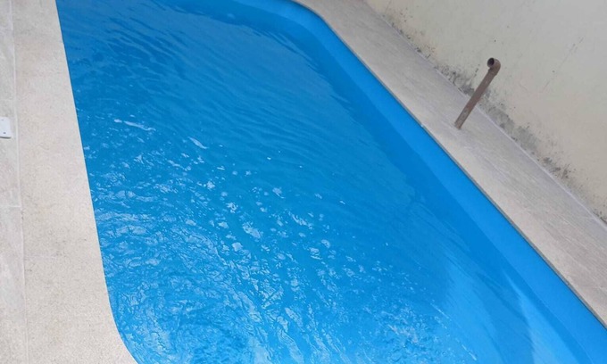 Tupy Casa | House with 2 bedrooms, swimming pool and barbecue, 8 minutes from the beach on foot.