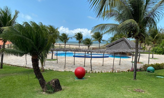 Touros Casa | House in a gated community surrounded by green spaces 150 meters from the beach.