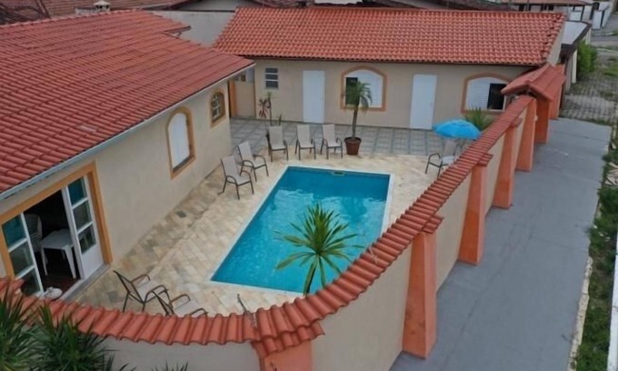 Florida Casa | Casa en Praia Grande de alto estándar con piscina a 100 metros de la playa