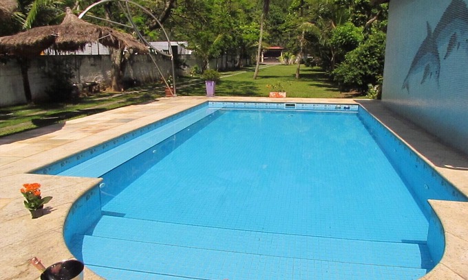Recreio dos Bandeirantes Casa | Casa en la habitación piscina Recreación y pequeños eventos.