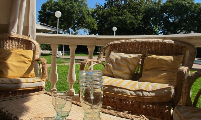Punta Umbria Apartamento | Casa con jardín y piscina a pocos pasos del mar