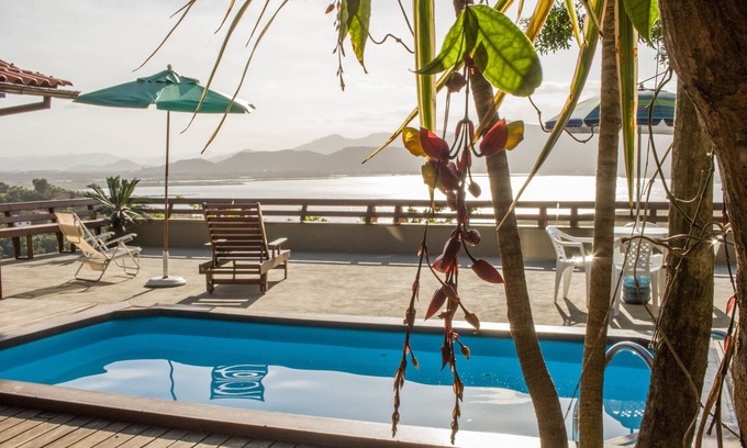 Garopaba Casa | Casa en una comunidad cerrada con piscina y espectaculares vistas de la laguna de Garopaba