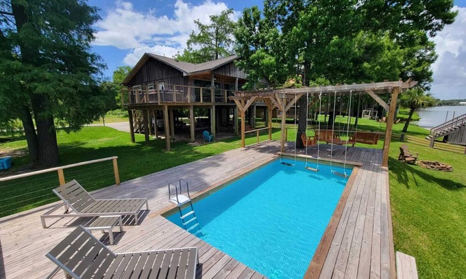 Barrett Casa | Houston Riverfront Getaway house with pool and hot tub