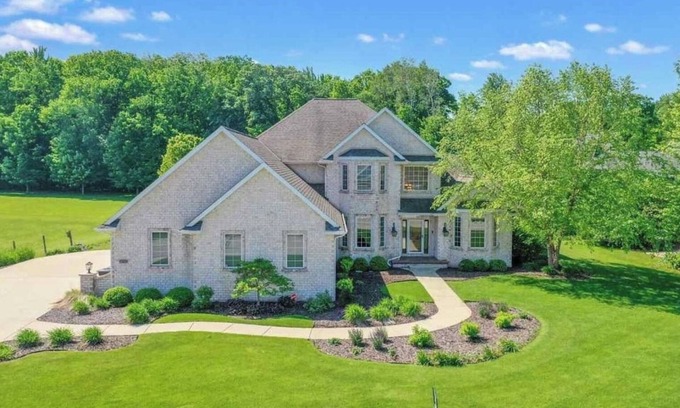 Hobart Casa | Huge home with theater, hot tub, golf cart, and just minutes from Lambeau Field!