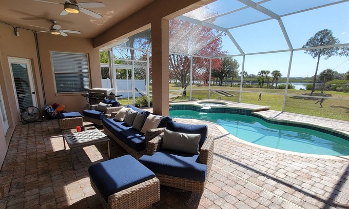 Tarpon Springs Casa | Huge Riverfront Home! Heated pool, Jacuzzi, and Kayaks Included!
