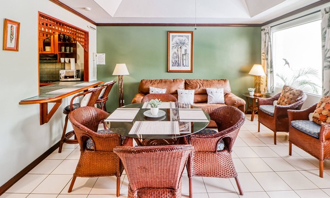 Damas Condominio | Ideally Located Tropical Escape W/ Lush Gardens, & Shared Pool!