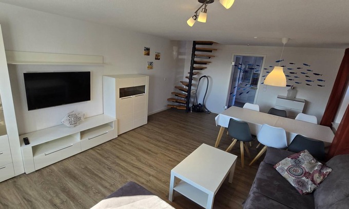 Dornumergrode Apartamento | In a quiet residential area + fenced garden + free WiFi + by the sea + dogs welcome + modern furnishings