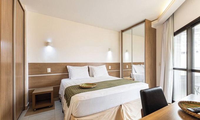 Boqueirao Apartamento | In front of the beach! Apartment with rooftop pool and balcony with view - ARK Houses