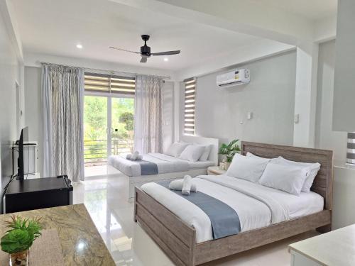 Panglao Casa | INATO SUITES Rm 2 2 queen beds