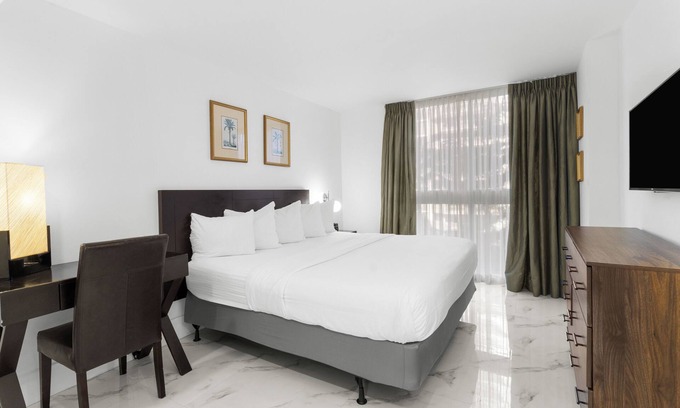 Coconut Grove Hotel | Indulge in Home Like Comfort! 4 Comfortable Units, Onsite Pool, Kitchen