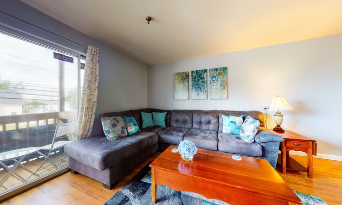 Gilford Condominio | Inviting condo in quiet locale with partial lake views, balcony & grilling area